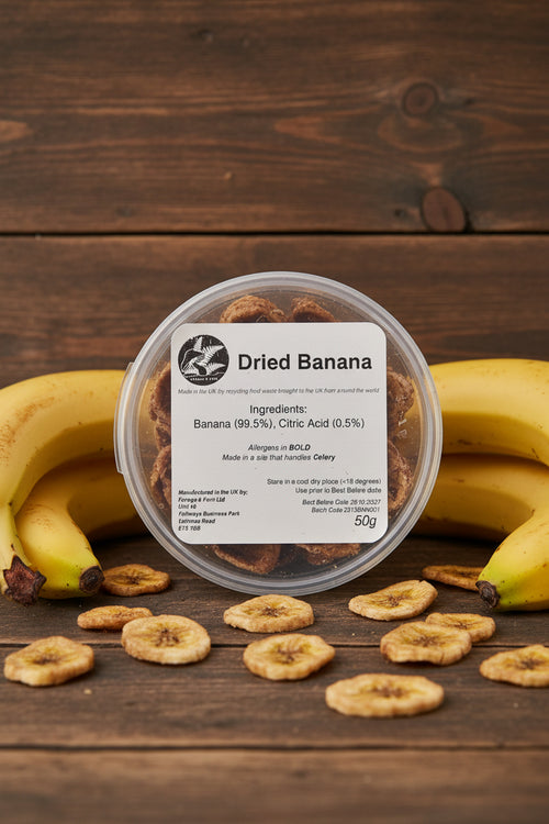 Dried banana in a container with a label on a rustic background