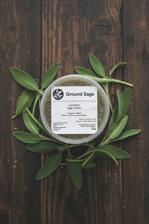 Container of ground sage with a label on a rustic background
